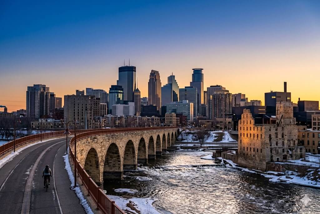 Minneapolis event WiFi and temporary internet rental — Stone Arch Bridge over Saint Anthony Falls at sunset